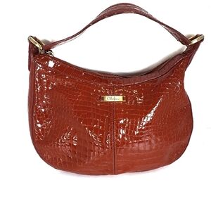 Cole Haan orange crocodile patern bag
